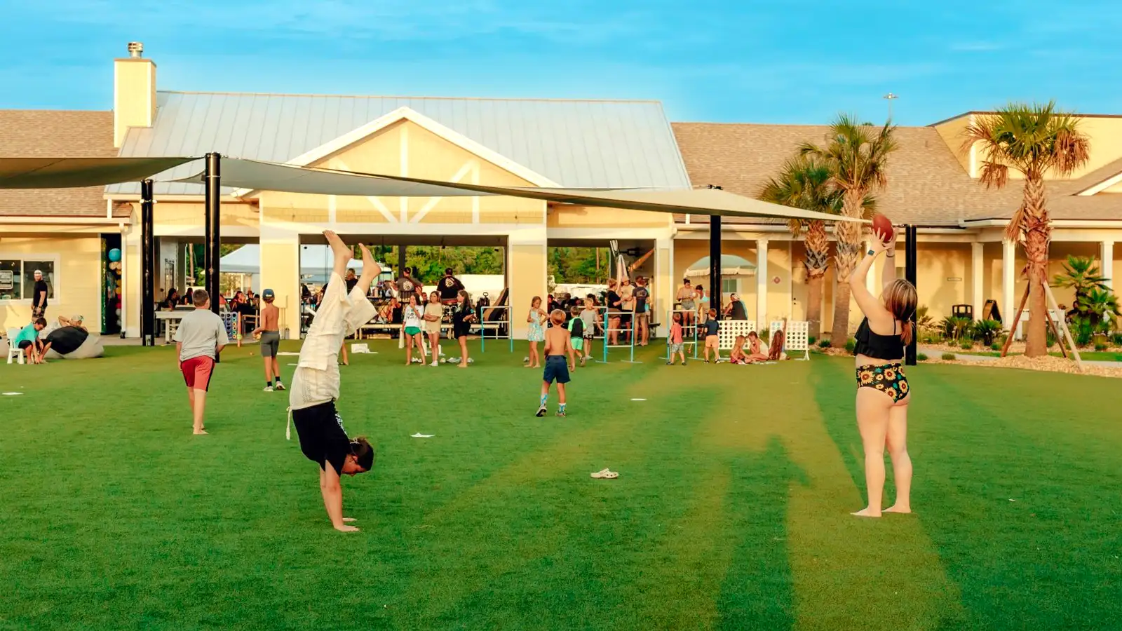 Island Oaks guests playing games on the lawn