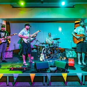 Live band on stage in the Island Oaks clubhouse