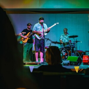 Live band playing on stage at Island Oaks