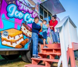 Mom giving her kids ice cream cones at Fire & Ice Cream Truck