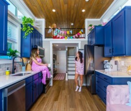 Women in an Island Oaks tiny cabin decorating for a party
